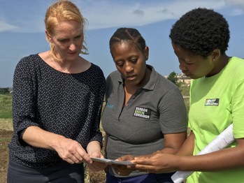 An expert and two colleagues from the city administration plan the sustainable design of a district in Durban, South Africa.
